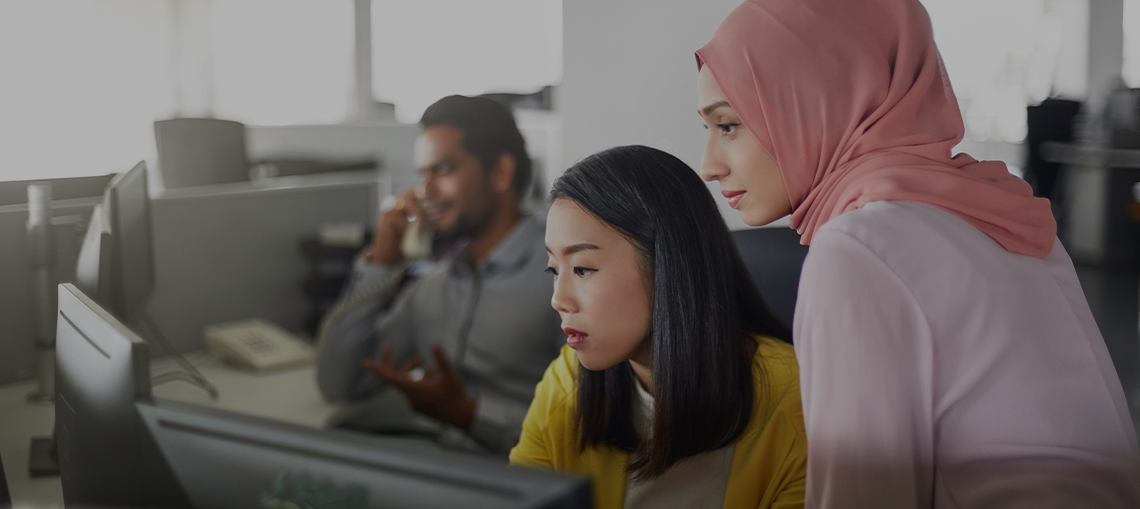 diverse adults working in an office