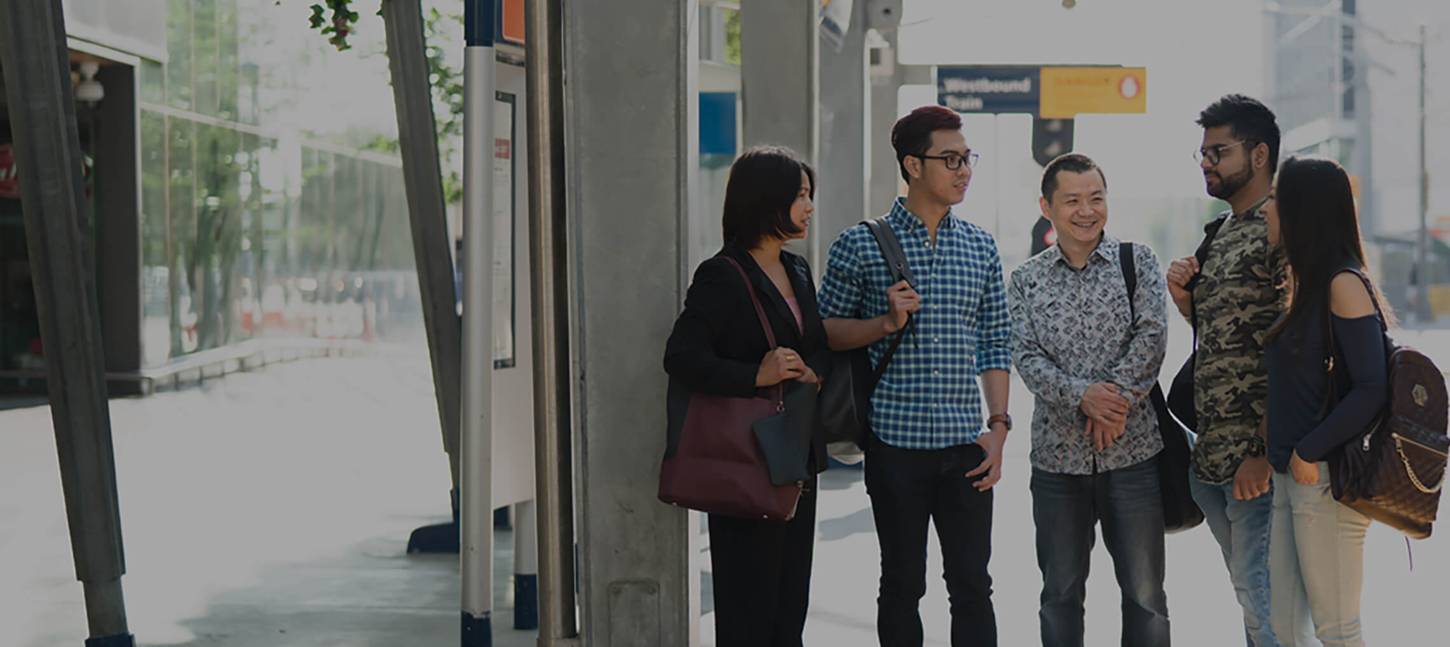 Group of Bow Valley College students by the train