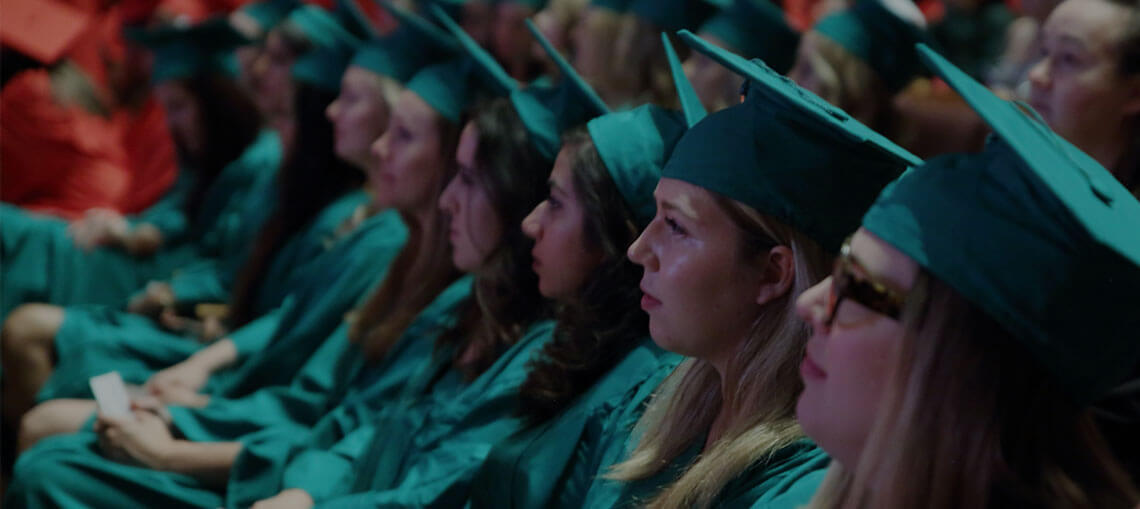 Line of Bow Valley College graduates in gowns
