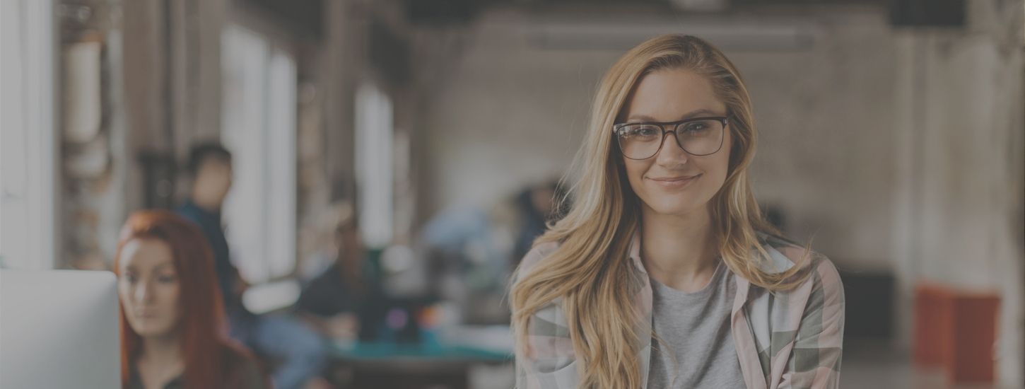 Female blonde BVC student wearing glasses