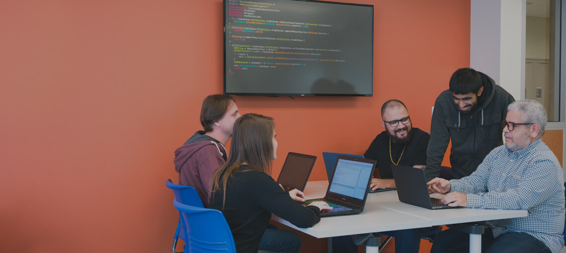 Software developers having meeting