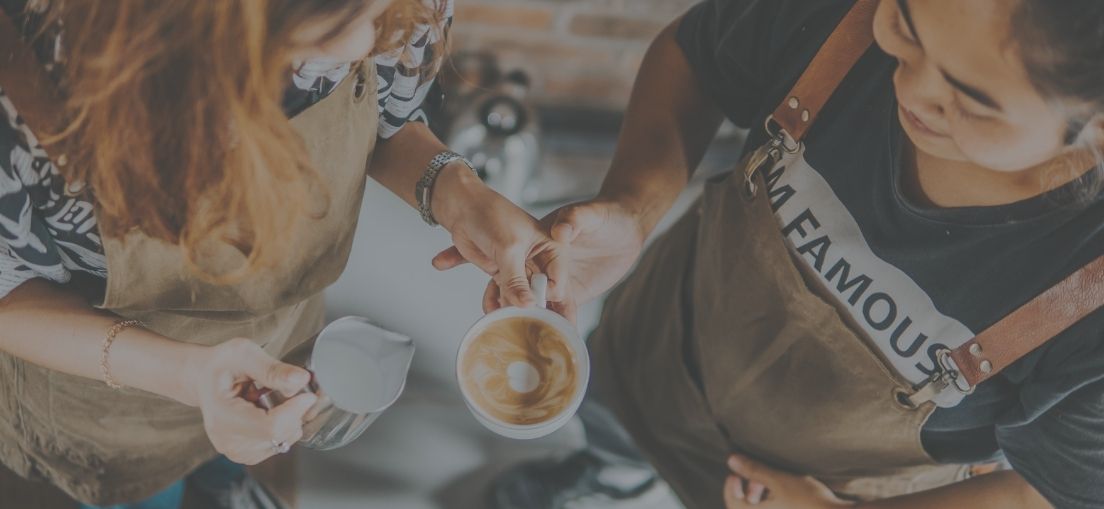 Baristas working in a coffee shop